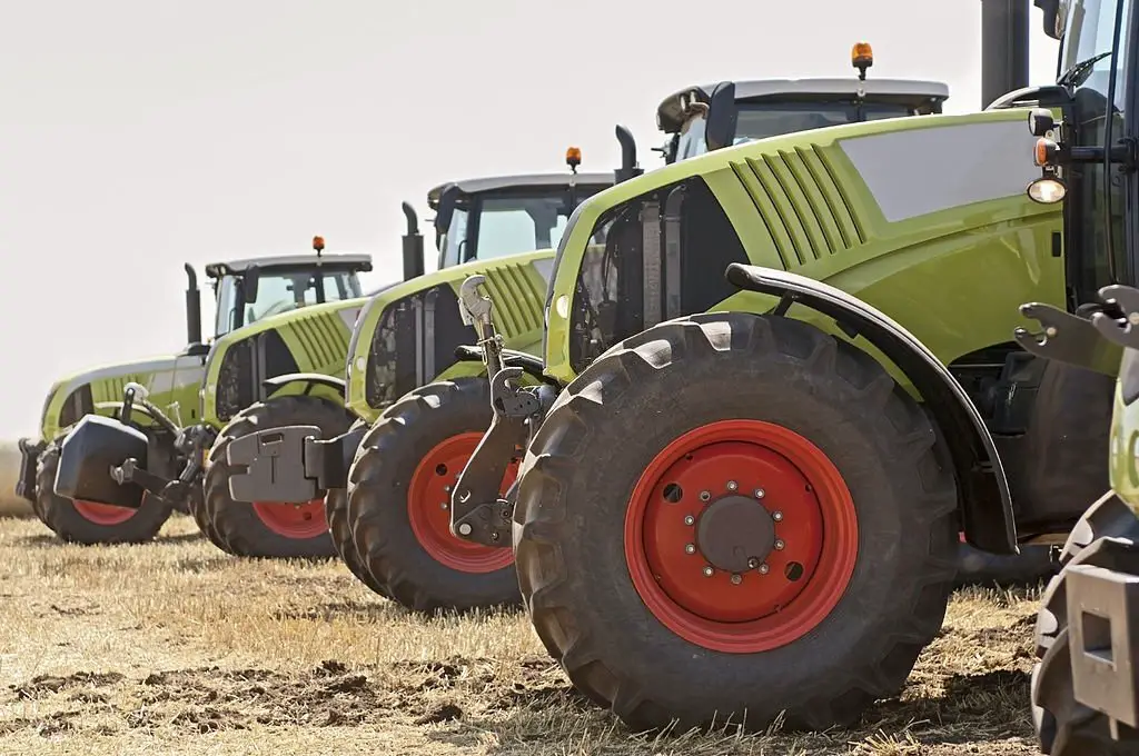 New tractors on field in a row